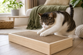 Cat scratching a wooden nail-file enrichment box